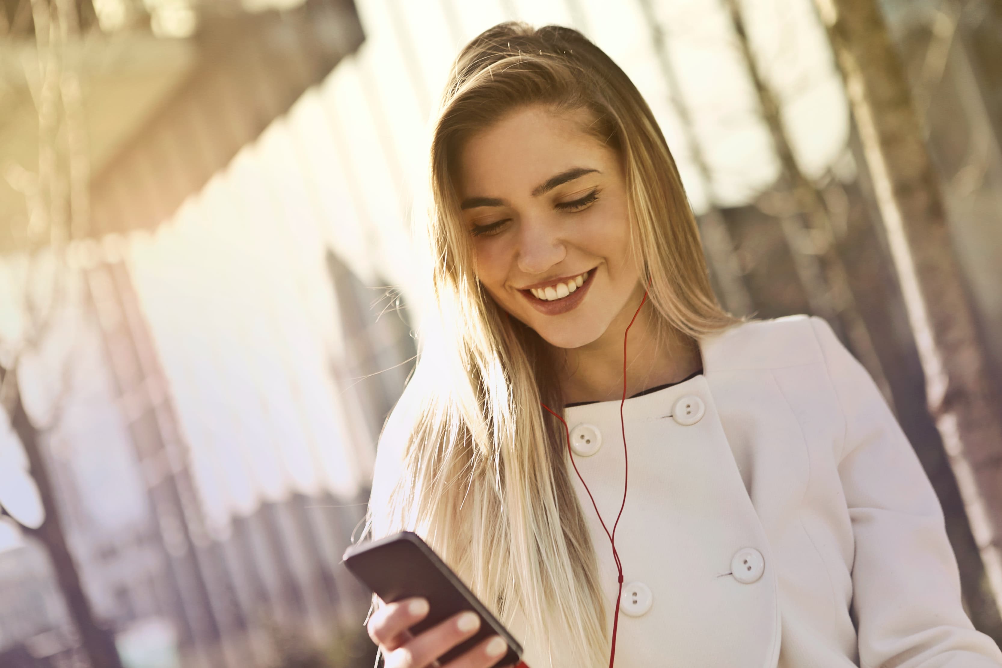 WomenHoldingPhone